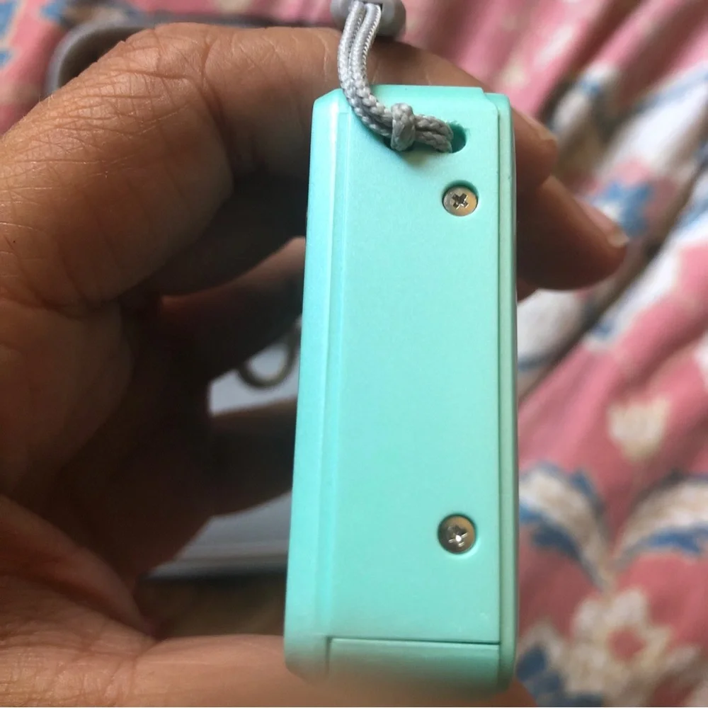44.0 mega pixels 16x zoom turquoise camera